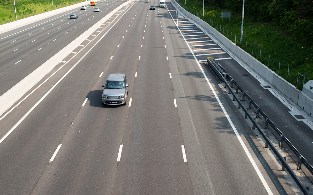 Motorway showing a car hogging middle lane